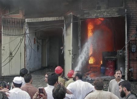 2012-09-12T083038Z_2_CBRE88B0HJ500_RTROPTP_2_PAKISTAN-FIRE 2012-09-12T083038Z_2_CBRE88B0HJ500_RTROPTP_2_PAKISTAN-FIRE