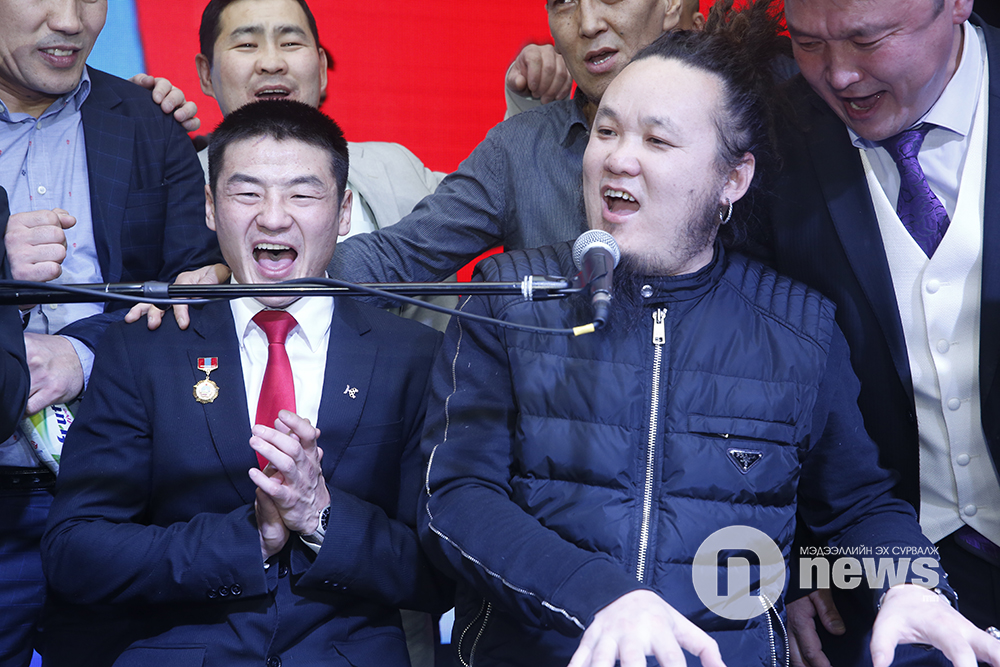 Boxer D.Otgondalai celebrates his Olympic medal