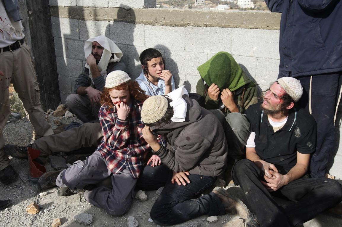 2014-01-07T151125Z_1558335225_GM1EA171SBB01_RTRMADP_3_ISRAEL-PALESTINIANS-SETTLERS
