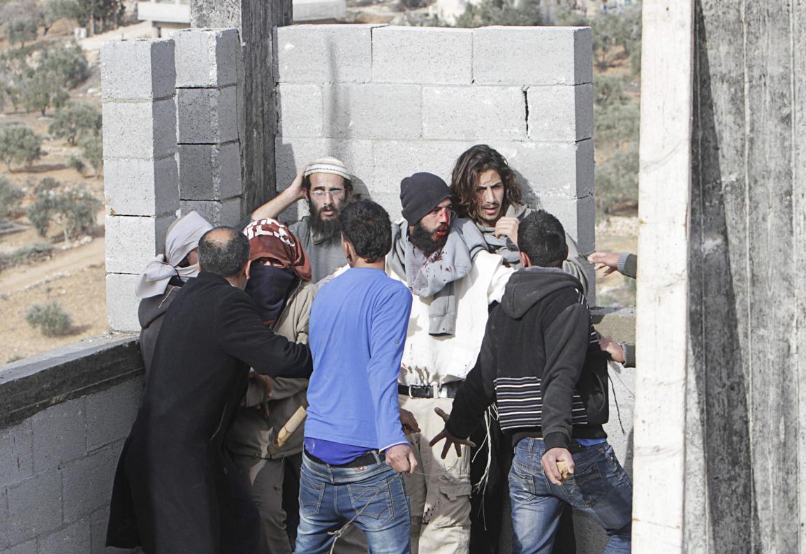 2014-01-07T172905Z_146831253_GM1EA18041P01_RTRMADP_3_ISRAEL-PALESTINIANS-SETTLERS