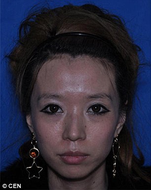 1415741439526_wps_83_Pic_shows_Zhang_Cher_is_a