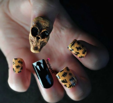 a98553_doctor_who_nail_art___the_silence_by_kayleighoc-d5iwd7k
