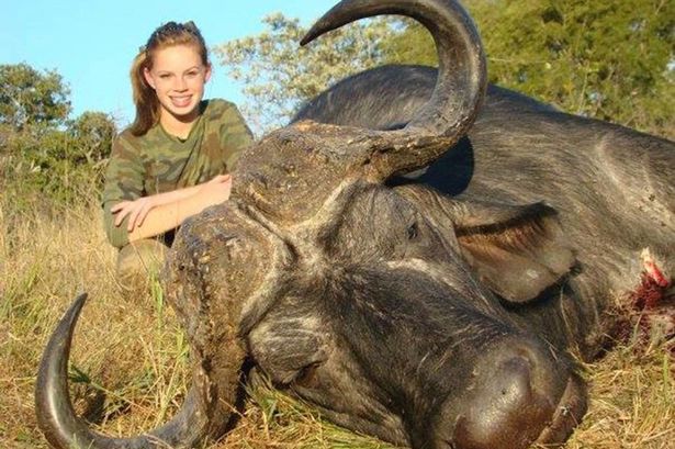 Cheerleader-attacked-for-shooting-leopards,,