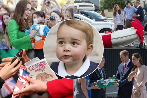 Catherine-Duchess-of-Cambridgeand-Prince-William-Duke-of-Cambridge-pose-with-a-surfboard