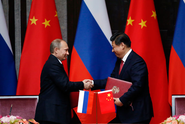 Владимир Путин Хятадад айлчлахдаа 20 гаруй гэрээ хэлэлцээрт гарын үсэг зурна